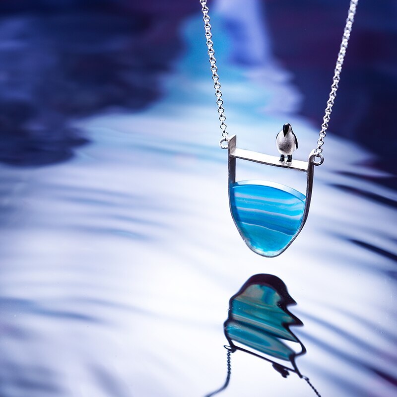 Collier pendentif Pingouin sur la banquise
