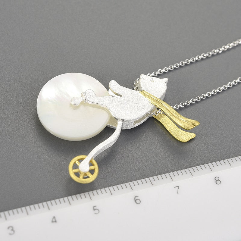 Collier pendentif Ours acrobate