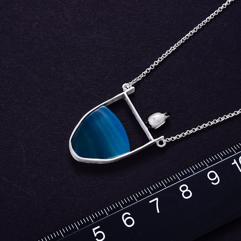 Collier pendentif Pingouin sur la banquise
