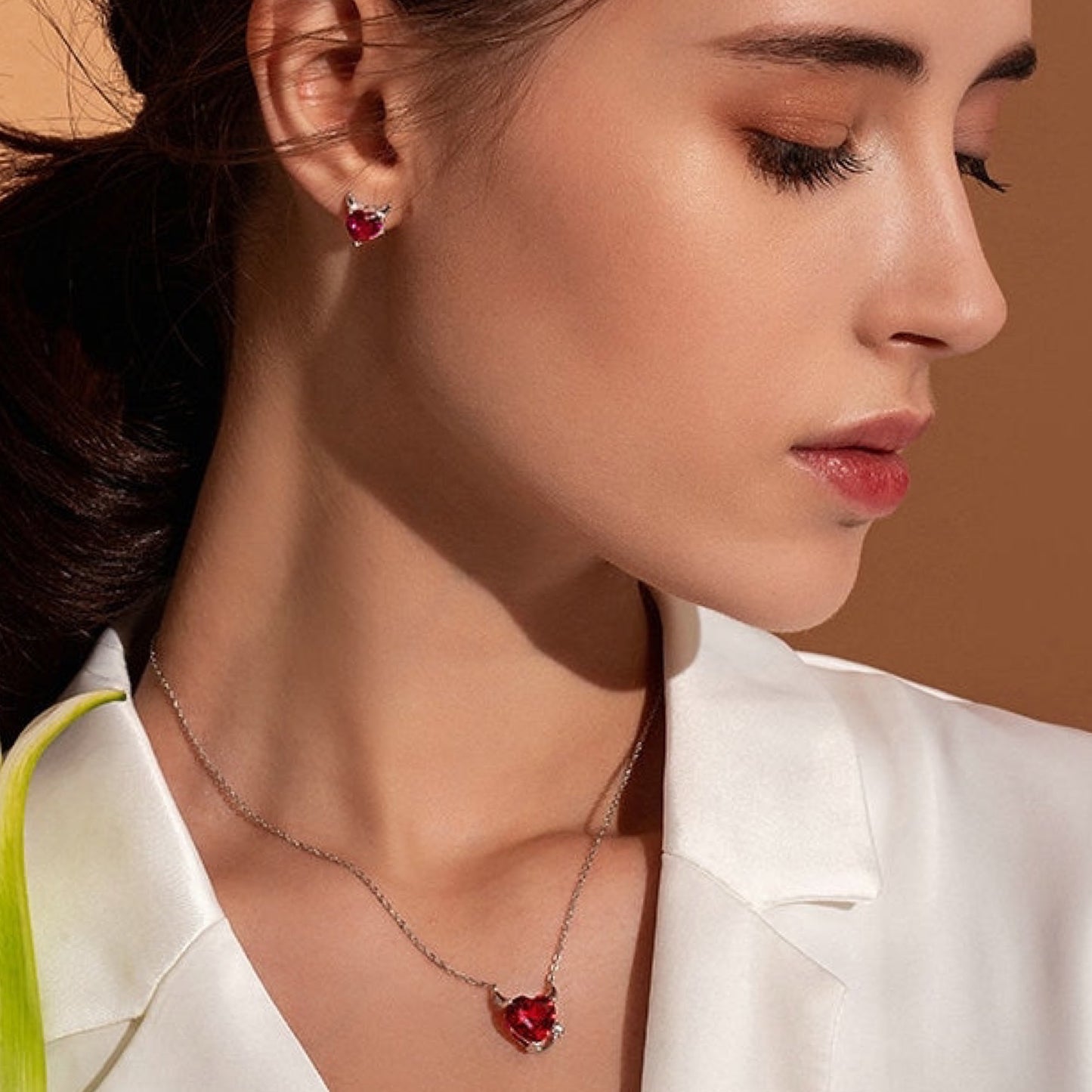Collana a forma di cuore con angelo o diavolo 
