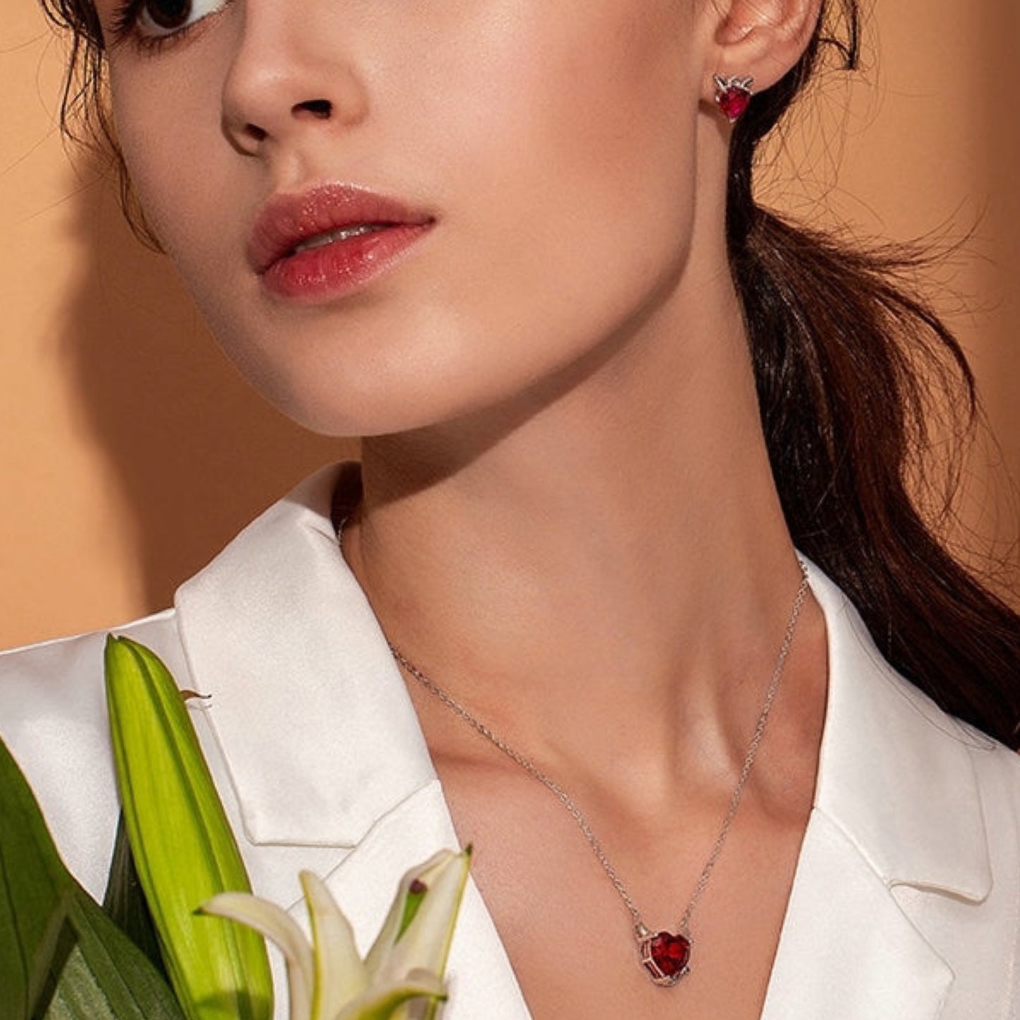 Collana a forma di cuore con angelo o diavolo 