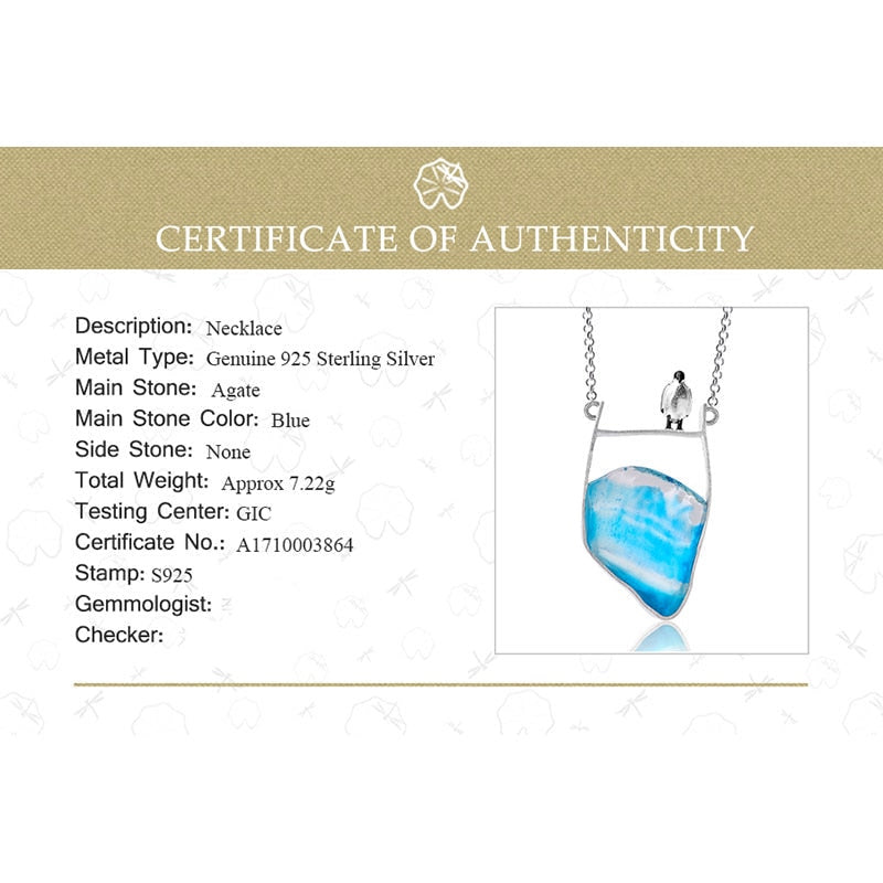 Collier pendentif Pingouin sur la banquise